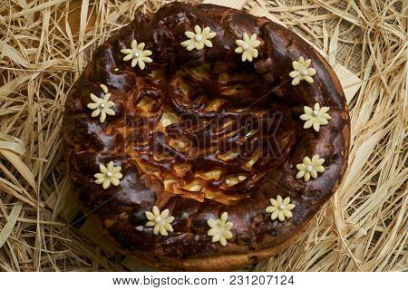 Traditional Ukrainian Wedding Bread Korovai Or Karavai With Decorations On Rustic Straw Background.