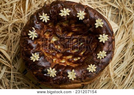 Traditional Ukrainian Wedding Bread Korovai Or Karavai With Decorations On Rustic Straw Background.