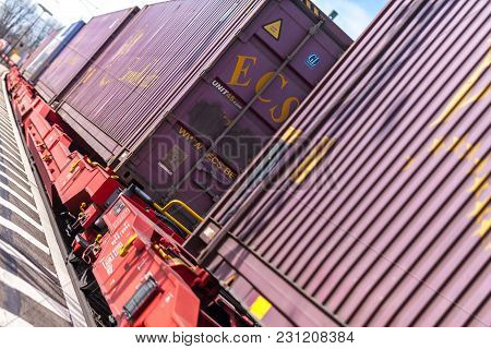 Fuerth / Germany - March 11, 2018: A European Freight Train Passes Train Station Fuerth In Germany