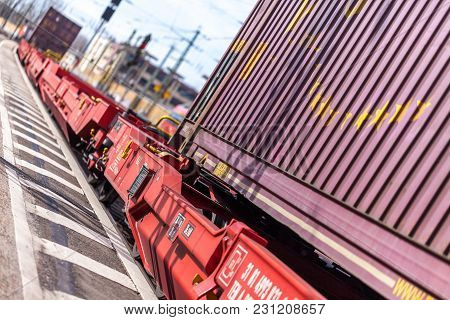 Fuerth / Germany - March 11, 2018: A European Freight Train Passes Train Station Fuerth In Germany