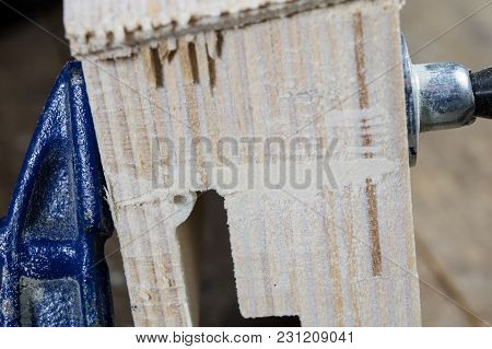 Carpenter's Clamp For Carpentry Work. Accessories In A Carpentry Workshop For Furniture Construction