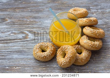 Traditional Greek Easter Biscuits Paskhalina Kuluria With Sesame Seeds On A Wooden Table, Selective 