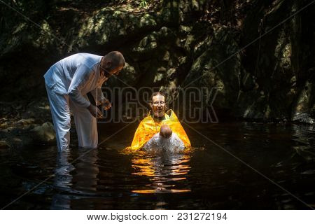KOH CHANG, THAILAND - MAR 10, 2018: During Christian sacrament of spiritual birth - Baptism. There are currently 10 Orthodox parishes in Thailand, Orthodoxy is practiced by 0.002% of population.