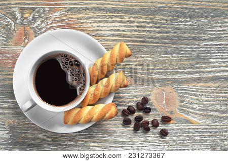 Coffee With Shortbread Cookies
Cup Of Coffee With Sweet Shortbread Cookies For Breakfast On Old Wood