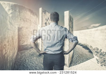 Business Difficulties And Challenges. Businessman In Front Of Labyrinth