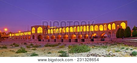 Evening Panorama From The Dried Up Bottom Of Zayanderud River  - Arched Brick Khaju Bridge In Bright