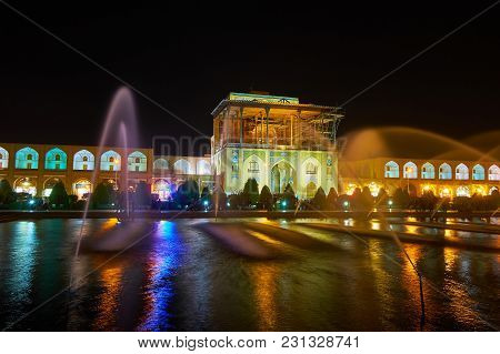 Isfahan, Iran - October 20, 2017: The Evening View Of Qapu Palace, Located On Nagsh-e Jahan Square W