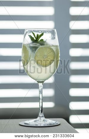 Tasty Cocktail With Lemon In A Beautiful Glass