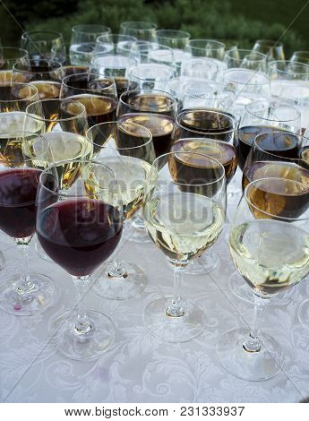 A Lot Of Glasses With Wine On Holiday