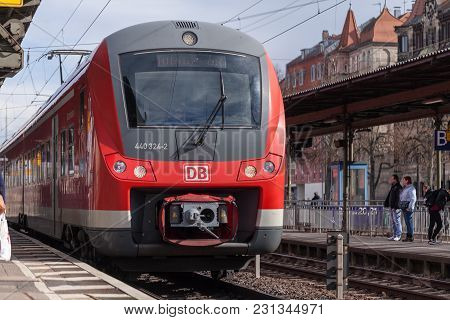 Fuerth / Germany - March 11, 2018: Re Regional Express Train From Deutsche Bahn Passes Train Station