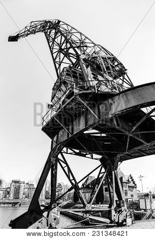 Old Metal Crane In Strasbourg Harbor, Industrial And Vintage