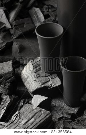 Two Matte Black Shot Glass .on Charcoal Background. Black Edition.creative.let's Drink.cheers.mockup