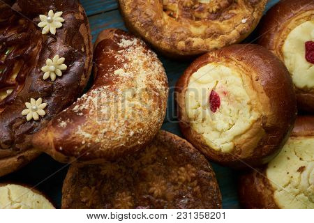 Traditional Russian Easter Baked Goods, Kulichi, Patties With Cottage Cheese, Karavai And Loaf Cake 
