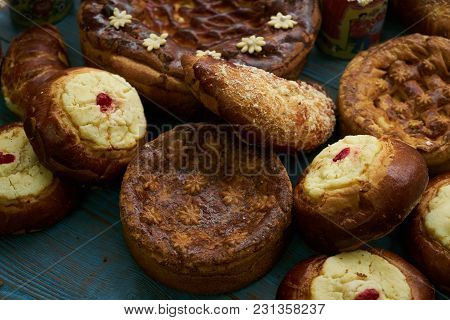 Traditional Russian Easter Baked Goods, Kulichi, Patties With Cottage Cheese, Karavai And Loaf Cake 