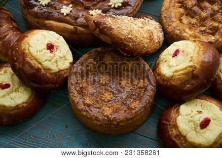 Traditional Russian Easter Baked Goods, Kulichi, Patties With Cottage Cheese, Karavai And Loaf Cake 