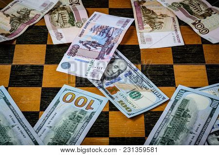 Chess Board With Cash And Chess On A Dark Background