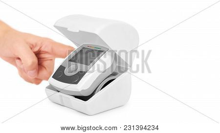 Blood Pressure Measurement Equipment Tensiometer In Hand Isolated On White Background. Copy Space, T