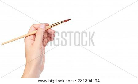 Paint Brush In Hand Isolated On White Background. Copy Space, Template.