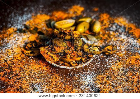 Popular Indian Squash Pickle Or Tinda Nu Athnu Or Achar In A Glass Plat With All Its Ingredients And