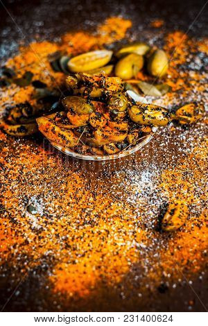Popular Indian Squash Pickle Or Tinda Nu Athnu Or Achar In A Glass Plat With All Its Ingredients And
