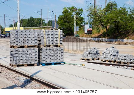 Paving Stones On City Street. Paving Stone Waiting For Workers. Road Repair Process. Road Maintenanc