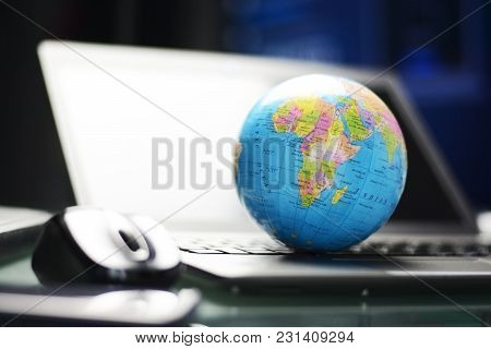 Global Business Or International Affairs Concept With Colorful Earth Globe On Computer Keyboard