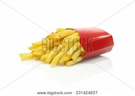 French Fries In A Red Carton Box In Close-up And Isolated On White Background
