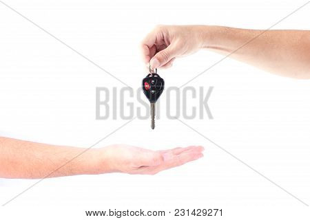 Man Hand Holding Car Keys Exchange Isolated On White Background