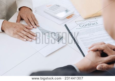 Bribery And Corruption Concept, Bribe In The Form Of Dollar Bills, Businessman Giving Money In The E