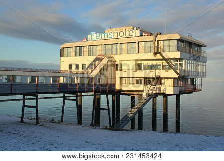 Delfzijl. January-17-2016. Eemshotel In Delfzijl Is On Stilts In The Winter. The Netherlands