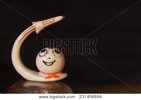 Porcelain Figurine Depicts Satellite Isolated On Black.  
Retro Sputnik Satellite  Vintage Style 
Sp
