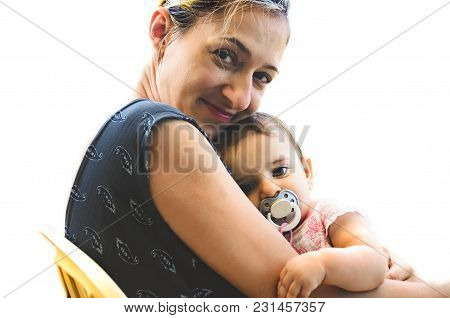 Newborn Hug Mom Before Sleep - Woman Smile Mother Cuddling Her Innocent Baby Girl With Pacifier