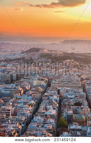 Cityscape Of Athens With Acorpolis Hill And Sea In Sunset Light, Greecer