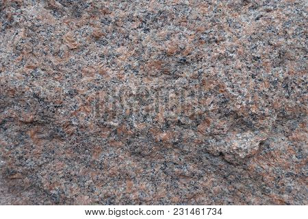Closeup Of Uneven Surface Of Pink Granite Stone