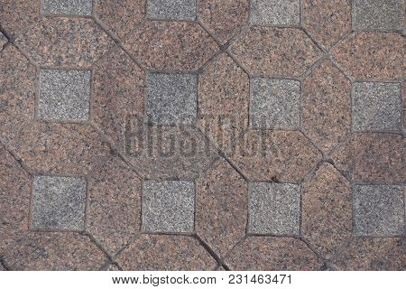 Pavement Made Of Pink And Gray Unpolished Granite Blocks