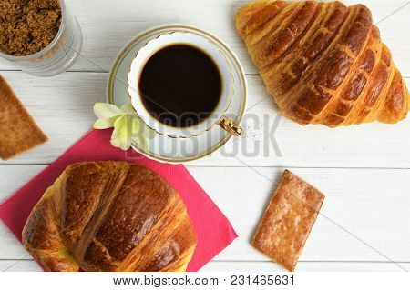 Vintage Coffee Cup With Espresso On A Saucer, Croissant On The Rose Table-napkin And Some Biscuits ,