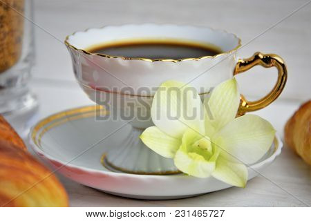 Vintage Coffee Cup With Espresso On A Saucer, Croissant On The Rose Table-napkin And Some Biscuits ,