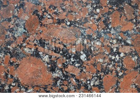 Grainy Pattern Of Polished Pink Granite Stone