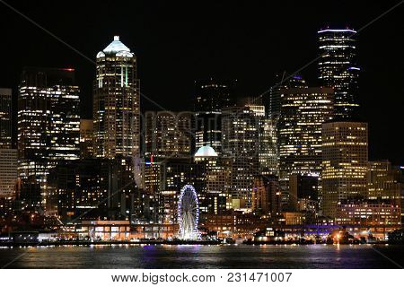 March 7, 2018 In Seattle, Wa:  Seattle Skyline Including The Large Ferris Wheel At The Waterfront Wi