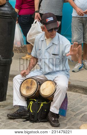 Havana, Cuba - January 16, 2017: Street Musician Perform For Tourists And Tips In Old Havana, Havana