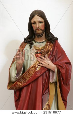 SISAK, CROATIA - DECEMBER 07: Sacred Heart of Jesus, statue in the Church of Holy Cross in Sisak, Croatia, on December 07, 2017.