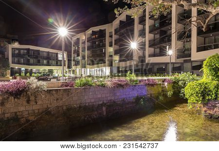 Bridge, Oil Mills And Old Platan In Night With Blue Illuminations. Mlini. Croatia