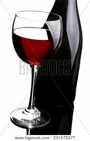 Wine In Glass With Bottle On Whiote Background