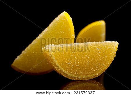 Marmalade As Lemon Clice Isolated On Black Background