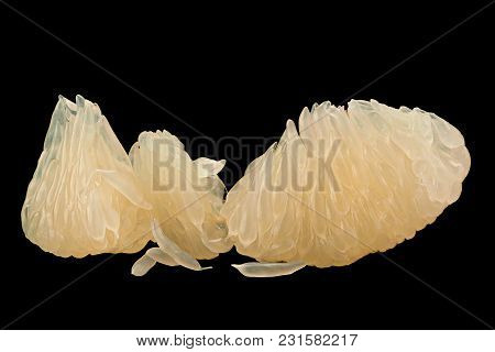Pomelit Fruit Pill Closeup Isolated On Black Background