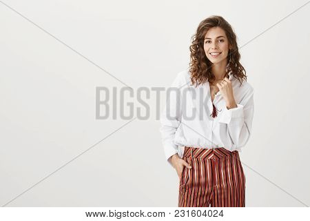 Simple Outfit Speaks Loudest. Portrait Of Emotive Charming Adult Woman With Trendy Hairstyle And Fan