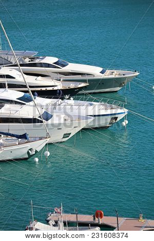 Monte-carlo, Monaco - March 17, 2018: Luxurious Yachts And Megayachts Lined Up In The Monte-carlo Ha