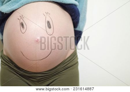 Happy And Funny Faces On A Pregnant Belly