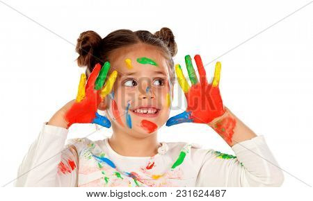 Funny girl with hands and face full of paint isolated on a white background