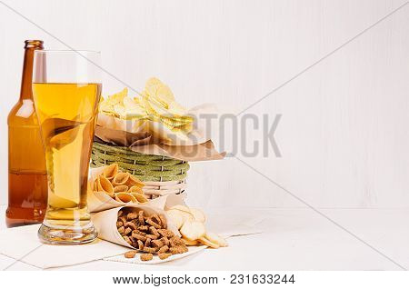 Summer Snacks  - Nachos, Croutons, Chips, Tortilla In Rustic Basket, Craft Paper Corners And Lager B